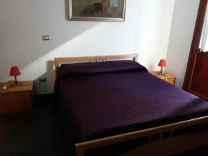 Postel nebo postele na pokoji v ubytování B&B Il Brigante