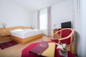 A bed or beds in a room at Postwirt