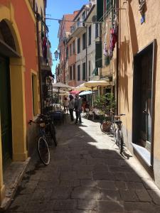 a street with bikes parked on the side of buildings at La casetta di Monterosso in Monterosso al Mare
