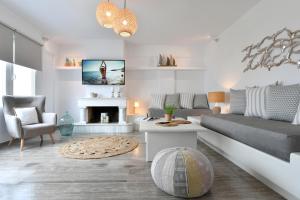 Area soggiorno di Ammos Luxury Rooms & Home