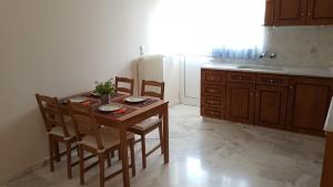 Kuchyň nebo kuchyňský kout v ubytování Galini Apartment + 12 fotografií