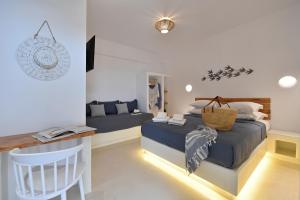 Posezení v ubytování Ammos Luxury Rooms & Home