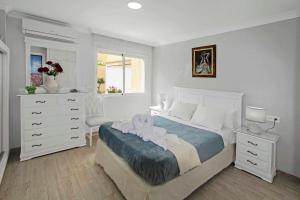 Posteľ alebo postele v izbe v ubytovaní Charming Central Apt in Marbella