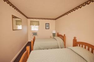 Llit o llits en una habitació de River View Resort