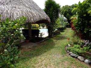 Jardin de l'établissement Pension De La Plage