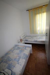 Posteľ alebo postele v izbe v ubytovaní Sun & Fun