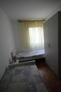 Posteľ alebo postele v izbe v ubytovaní Sun & Fun