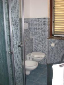 Kupaonica u objektu Elios Residence Hotel