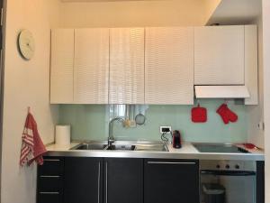 A kitchen or kitchenette at Visconti apartment.