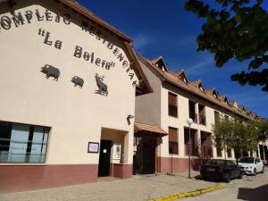 a building with pigs on the side of it at Ariosa in Arroyo Frio