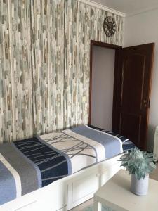 Katil atau katil-katil dalam bilik di Mira House