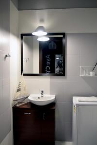 Kúpeľňa v ubytovaní APARTAMENT TARASY GDYNI z OGRÓDKIEM