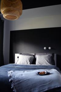 Posteľ alebo postele v izbe v ubytovaní APARTAMENT TARASY GDYNI z OGRÓDKIEM