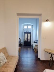 a living room with a couch and a table at La Capitana Old San Juan in San Juan