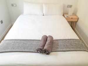 Postel nebo postele na pokoji v ubytování San Juan Guesthouse