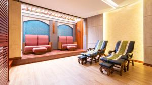 a waiting room with chairs and a waiting station at Khaolak Bayfront Resort in Khao Lak