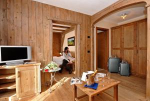 TV a/nebo společenská místnost v ubytování Hotel Touring