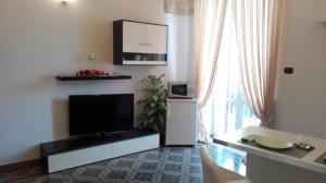 TV a/nebo společenská místnost v ubytování B&B del Corso