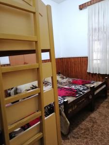 Postel nebo postele na pokoji v ubytování Tiger House Guest House