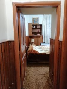 Postel nebo postele na pokoji v ubytování Tiger House Guest House