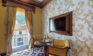 Istumisnurk majutusasutuses Historic Boutique Hotel Cattaro