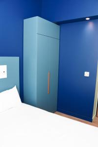 เตียงในห้องที่ ibis budget Langres