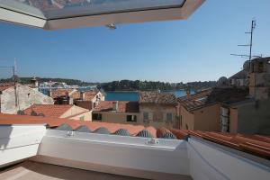 a view of a city from a balcony at Casa Colloredo Free Parking in Rovinj