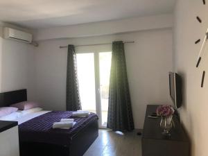 Posteľ alebo postele v izbe v ubytovaní apartmani mihaljević