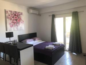 Posteľ alebo postele v izbe v ubytovaní apartmani mihaljević
