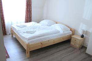 Postel nebo postele na pokoji v ubytování Enjoy Inn
