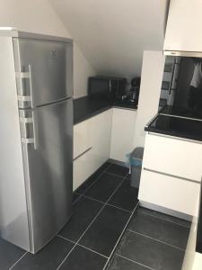 Kuchyňa alebo kuchynka v ubytovaní apartmani mihaljević
