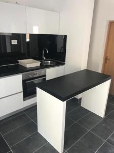 Kuchyňa alebo kuchynka v ubytovaní apartmani mihaljević