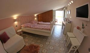 מיטה או מיטות בחדר ב-Room and Apartment Doris