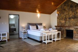 מיטה או מיטות בחדר ב-Kramersdorf Guesthouse