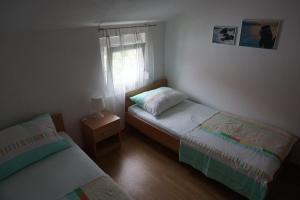 Posteľ alebo postele v izbe v ubytovaní Apartment IJ 3stars 4-6 persons
