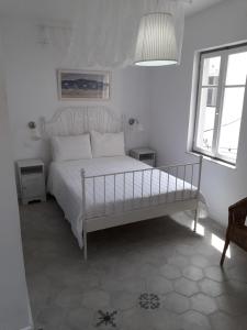 Postel nebo postele na pokoji v ubytování Filenia