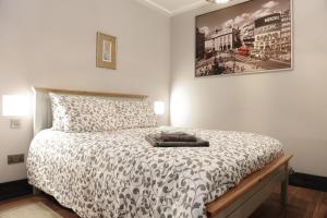 Кровать или кровати в номере Talbot Coach House
