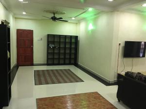 A television and/or entertainment centre at CM HOMESTAY