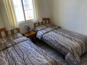 Ένα ή περισσότερα κρεβάτια σε δωμάτιο στο Macerana 1, Torreta III, Torrevieja