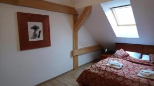 Postel nebo postele na pokoji v ubytování Enjoy Inn