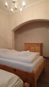 Postel nebo postele na pokoji v ubytování Enjoy Inn