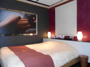 Postel nebo postele na pokoji v ubytování Hotel Regina + 15 fotografií