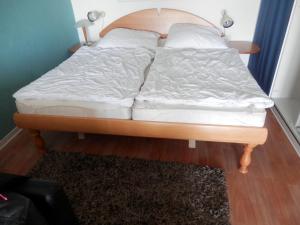 Postel nebo postele na pokoji v ubytování Ostseeblick Heiligenhafen
