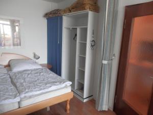 Postel nebo postele na pokoji v ubytování Ostseeblick Heiligenhafen