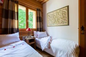 Postel nebo postele na pokoji v ubytování La Cabane de Serre-Chevalier, dans un esprit chalet, commune de Le Monêtier-les-Bains