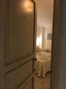 Łóżko lub łóżka w pokoju w obiekcie Hotel Sorgente