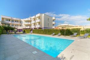 Bazén v ubytovaní Travini Hotel Residence alebo v jeho blízkosti