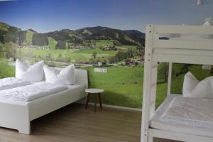 a bedroom with a bunk bed and a mountain view at Appartment Moltke in Herbolzheim