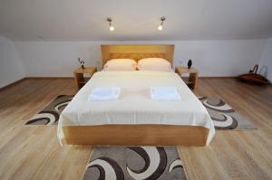 Postel nebo postele na pokoji v ubytování Guest House Korita