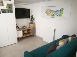 A television and/or entertainment centre at Little House